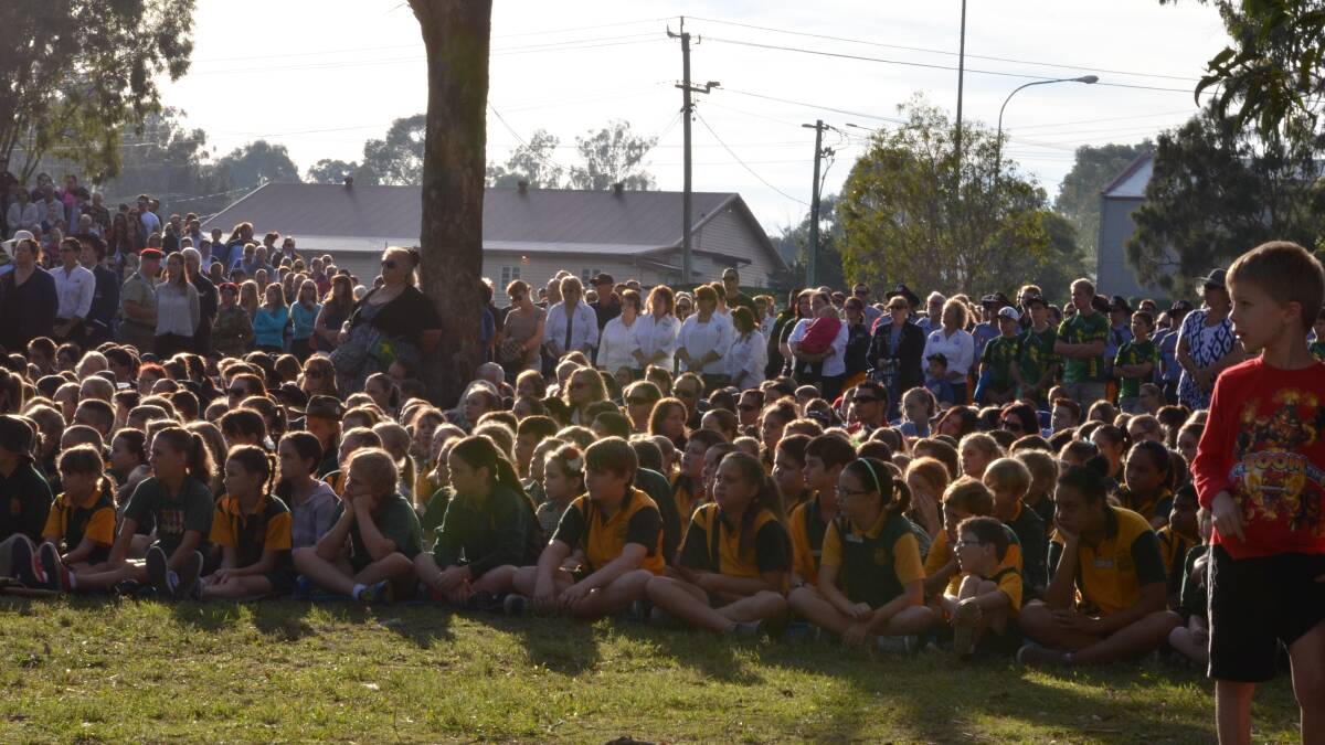 Hundreds of school students joined thousands of people at the Jimboomba Anzac Day service this morning.