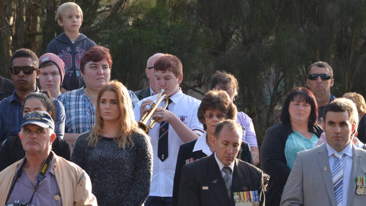 Flagstone Community College student Jack Wylie plays The Last Post.