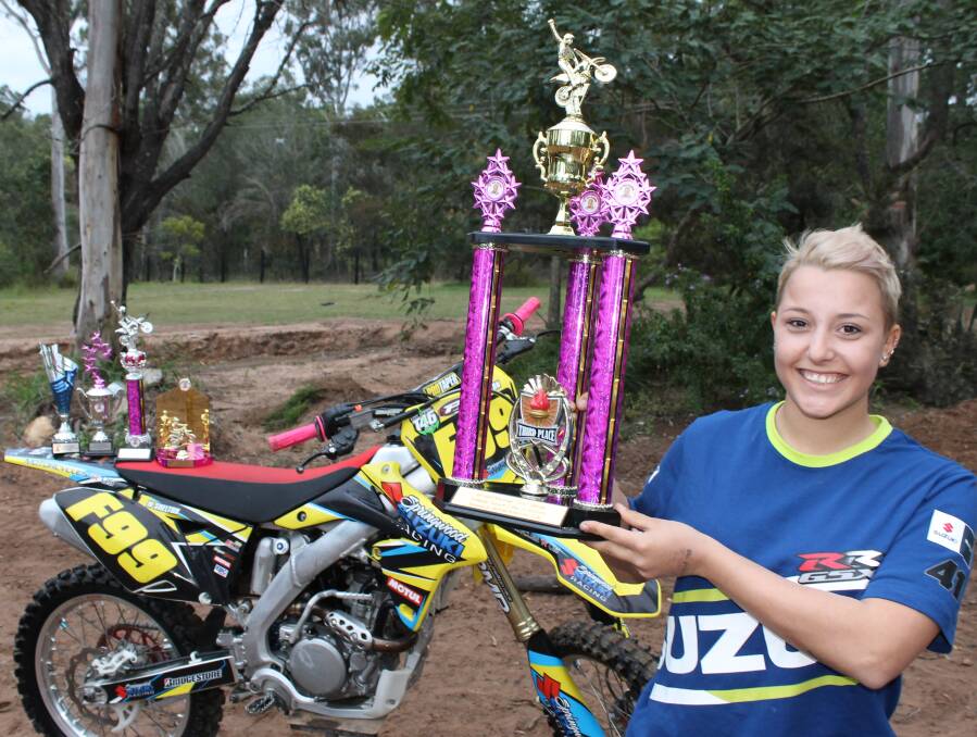 North Maclean teenager Macayleigh Shelton celebrates her success in the 2015 Go Girl motocross racing series.