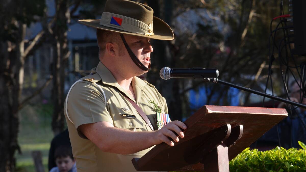 Major D.T O'Brien addresses the crowd about the importance of Anzac Day.