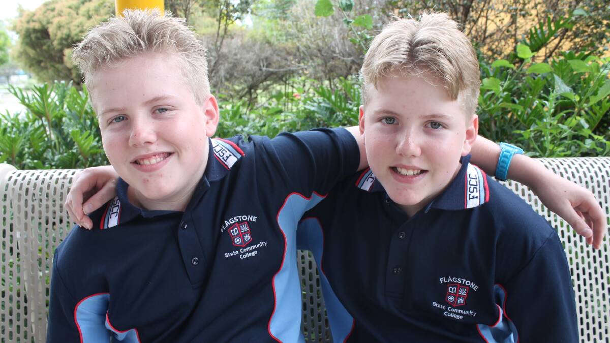 Twins Joshua and Matthew Clarke started year 7 at Flagstone State Community College on Tuesday.