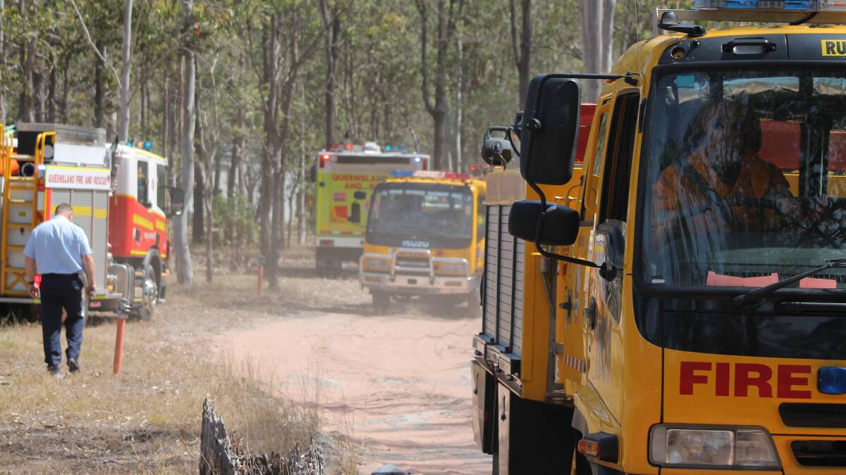 Rural fire crews from Jimboomba, Greenbank and Woodhill at the scene of a house fire on Kurrajong Road in Jimboomba.