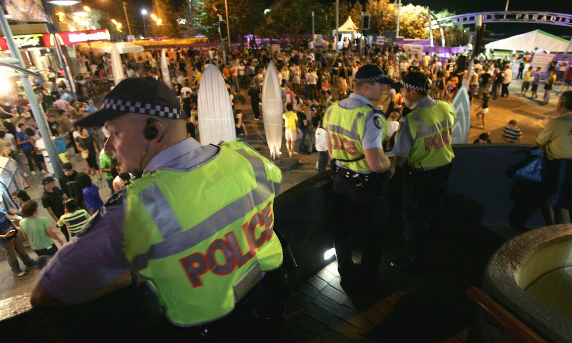 Police keep an eye on schoolies celebrations at Surfers Paradise.