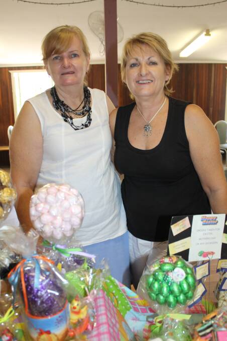 Sue Simpson of Slacks Creek and Linda Thompson of Buccan sold lollies from their new stall at the Logan Village markets on Saturday
