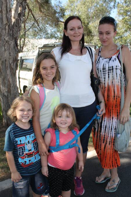 Wattie McKay, 4, and Breeya McKay, 8, Bella Lawrie, 2, Deb Lawrie and Cara Lawrie came from the Gold Coast and Woodridge to explore the Logan Village markets on Saturday. 