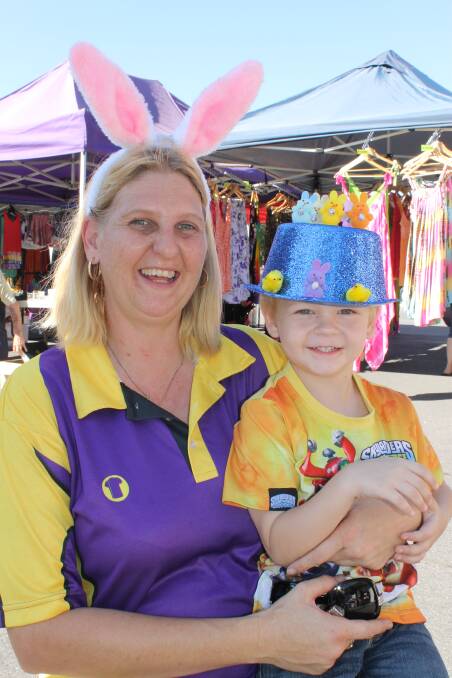Belinda Forgacs and Michael Forgacs, 4, before he took part in the Easter hat parade at Logan Village on Saturday.