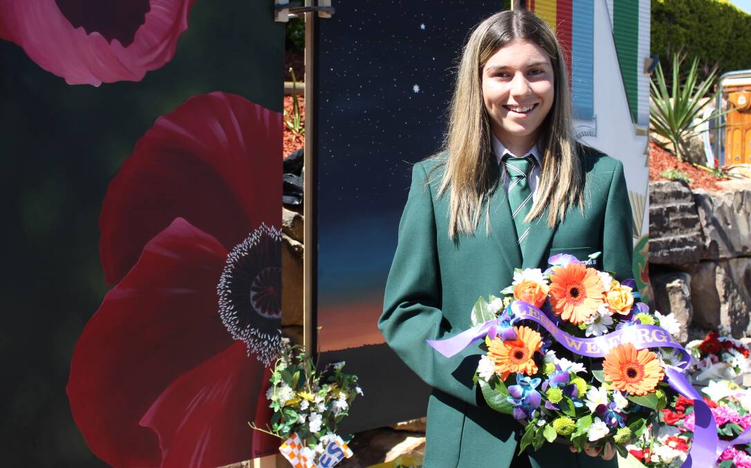 Park Ridge State High School student Peta-Louise Beardsley laid a wreath at the Anzac Day service.
