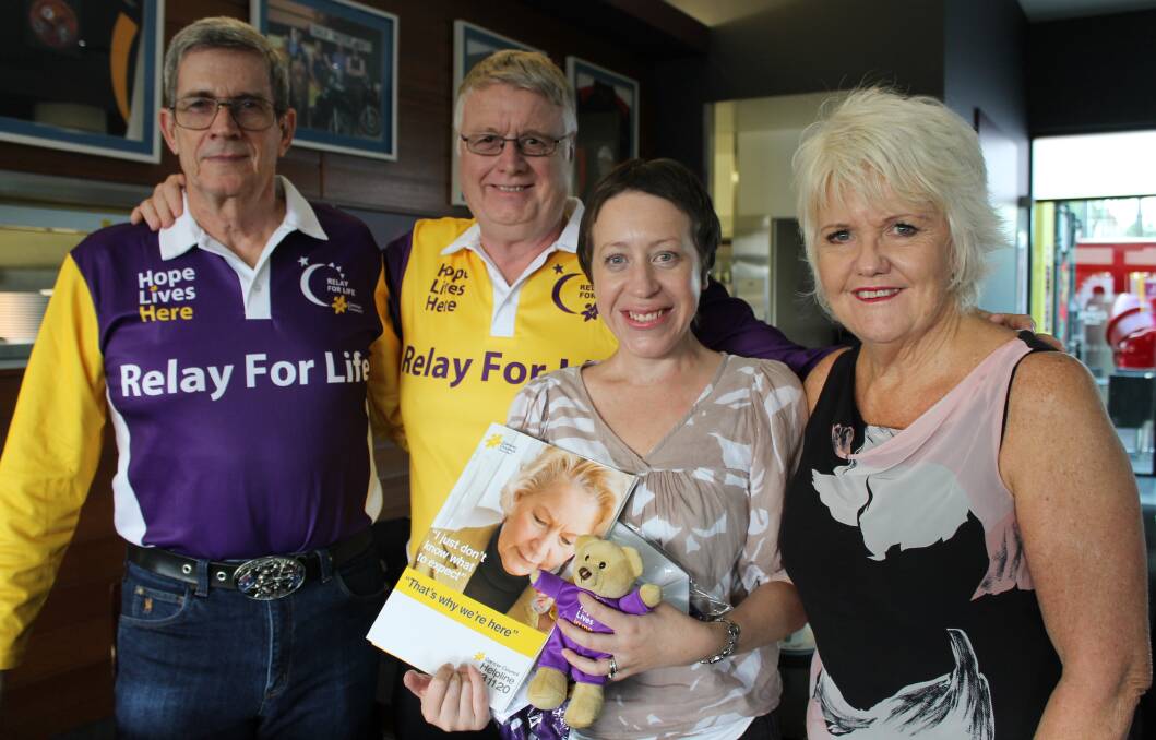Jimboomba Relay for Life committee member Ray McCabbin, vice chairman David Kenny and Gold Coast region Relay for Life co-ordinator Di Dixon thank Times journalist Natalie Hart for her work with the Relay fundraiser.