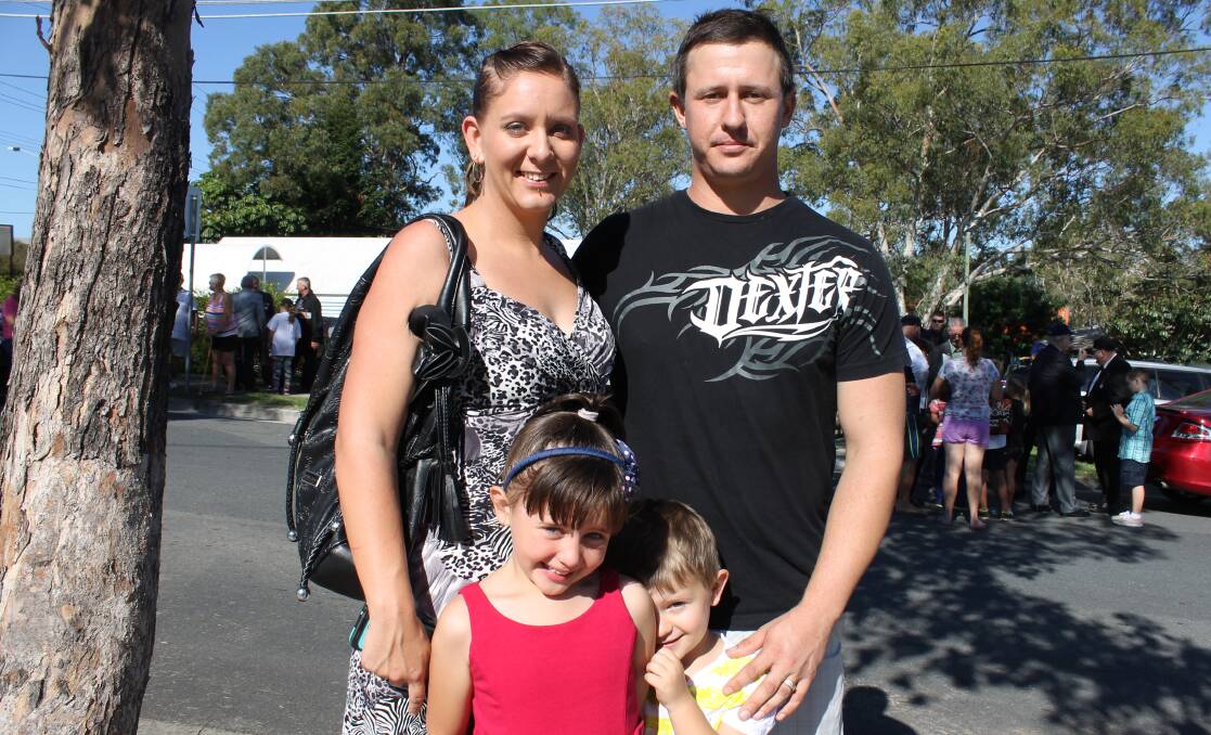 Kathryn and Justin Dennis of Crestmead, with children Tahlia and Jack, turned out to watch the parade.
