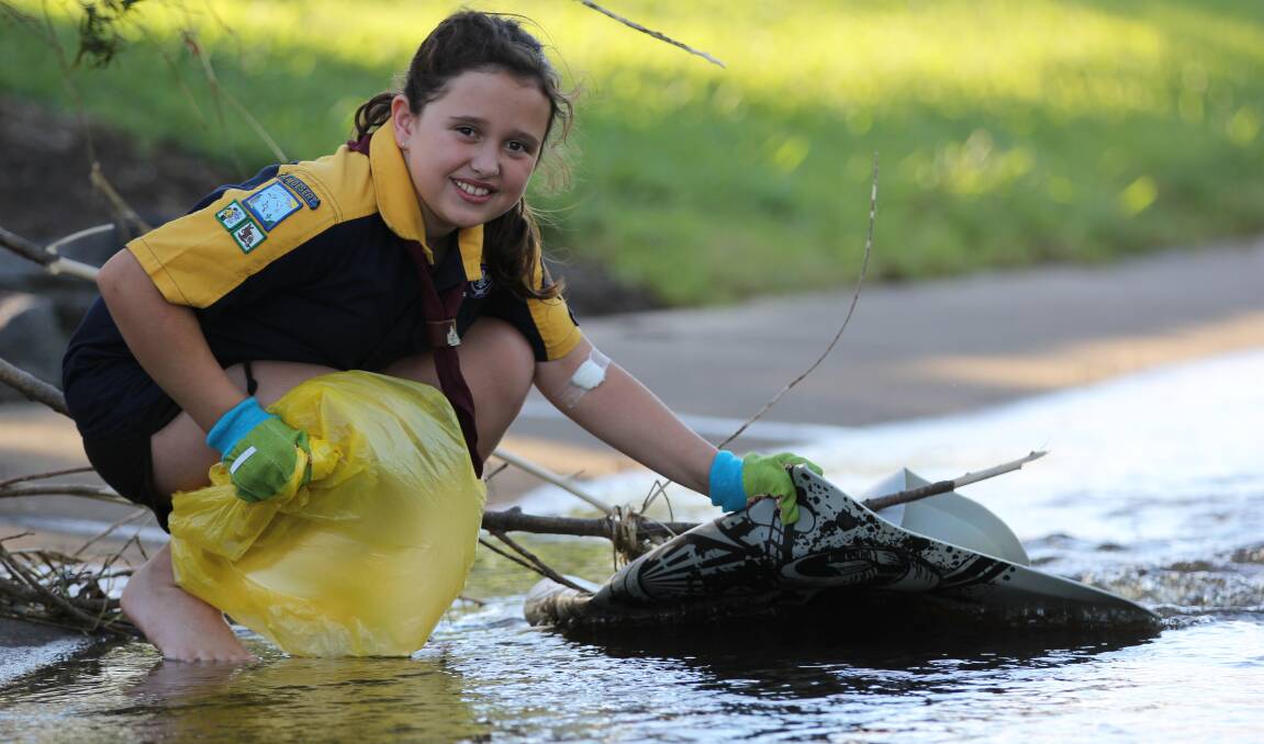 Beaudesert Scouts joey Caitlin Ferguson, 9, will volunteer for Clean Up Australia Day for the third year in a row.