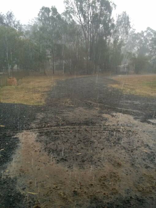 Sharon Richards shared this photo on the Jimboomba Times Facebook page of torrential rain during Thursday's storm.