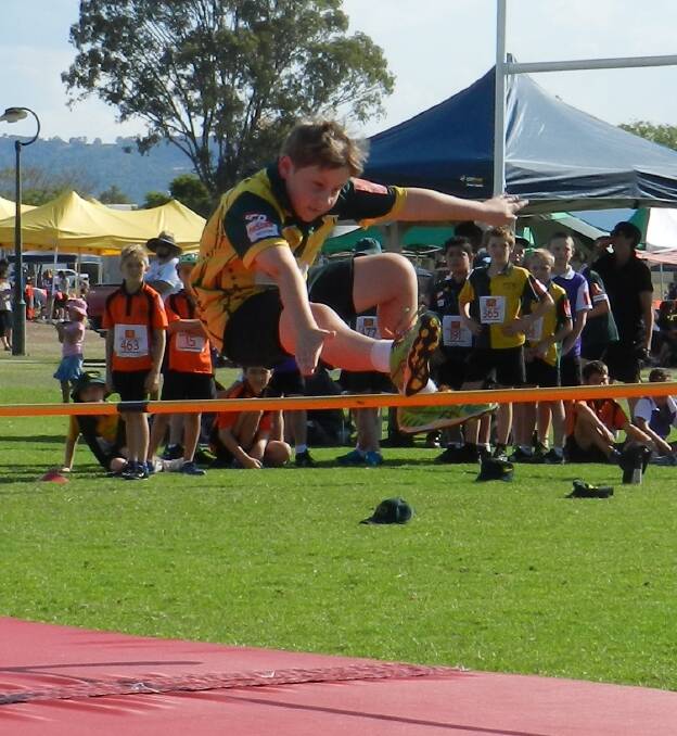 Hayden Lovaszi competes in the high jump at the Laidley athletics carnival.