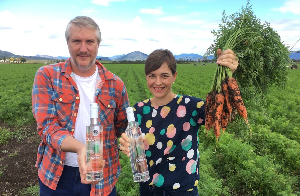 WHAT'S UP DOC: Jason Hannay of Flinders Peak Winery and Gen Windley of Kalfresh Vegetables with the newly created Carrot Vodka.