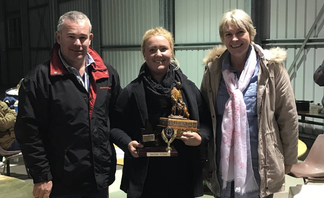 Amy Lloyd (centre) was awarded Novice Handler of the Year by the Queensland Working Sheepdog Association. Photo: Supplied