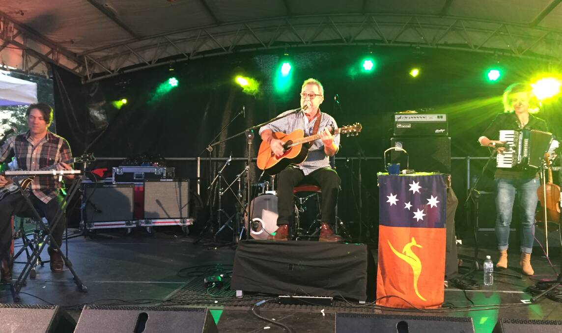 TRUE BLUE EVENT: Australian music icon John Williamson hit the stage as the sun set at Logan Village Hotel, with the event raising funds for flood-affected communities. Photo: Georgina Bayly