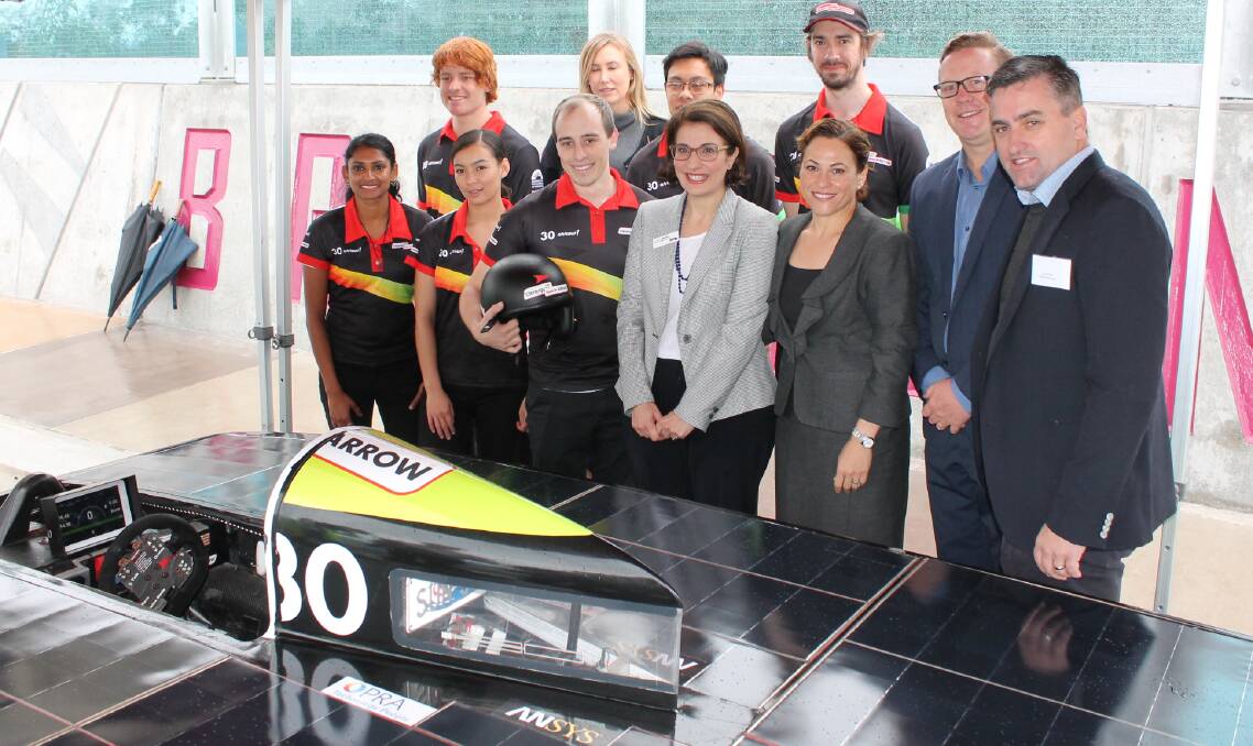 SOLAR FUTURE: Deputy Premier Jackie Trad (third from right) with Australia's premier solar racing team on Flagstone Bridge. Photo: Michael Burge