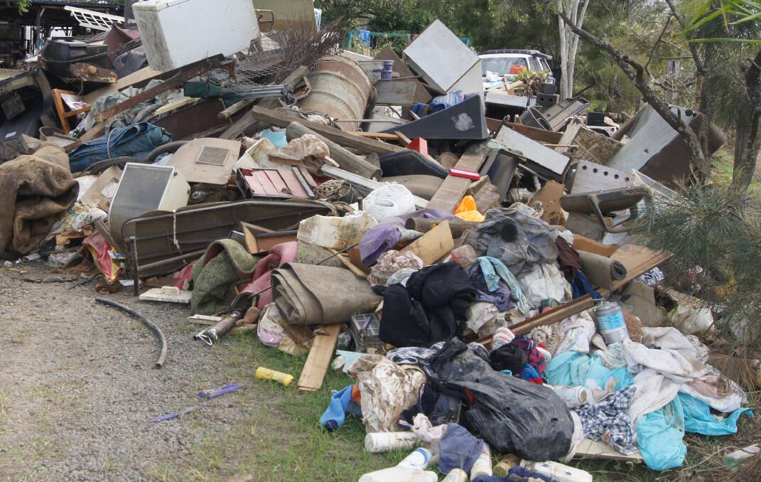 BIG CLEAN UP: Flood-damaged property in North Maclean. Photo: Georgina Bayly
