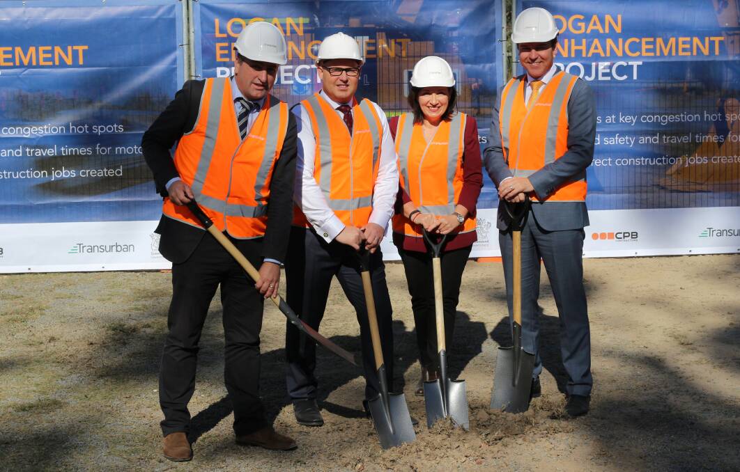 DIGGING IN: Member for Logan Linus Power, state treasurer Curtis Pitt, member for Algester Leeanne Enoch, and Transurban Queensland group general manager Wes Ballantine turn the sod on the Logan Enhancement Project. Photo: Supplied