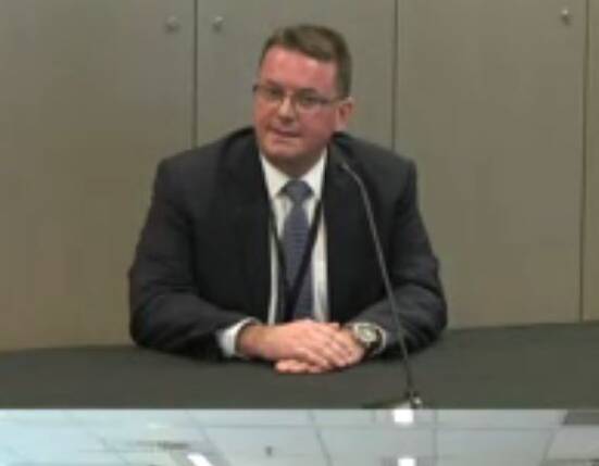 Screenshot of Logan City Council mayor Luke Smith at today's Crime and Corruption Commission hearing, which was streamed live online.