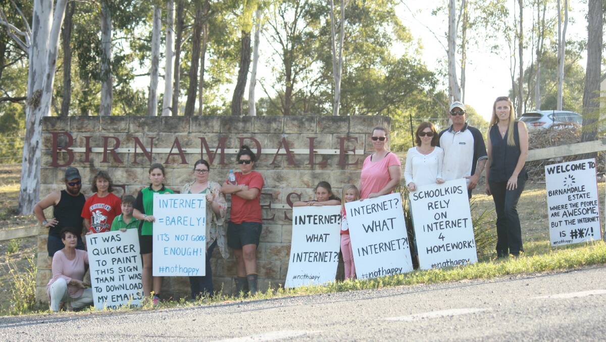 NOT HAPPY: Di McMath (far right) and other residents of Birnamdale Estate, Mundoolun, frustrated by lack of reliable internet services.  
