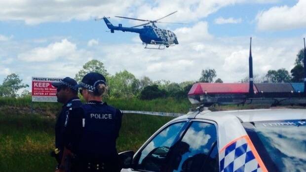 Police search an abandoned block in Kingston on Wednesday for signs of a missing Logan duo. Photo: 7 News Queensland