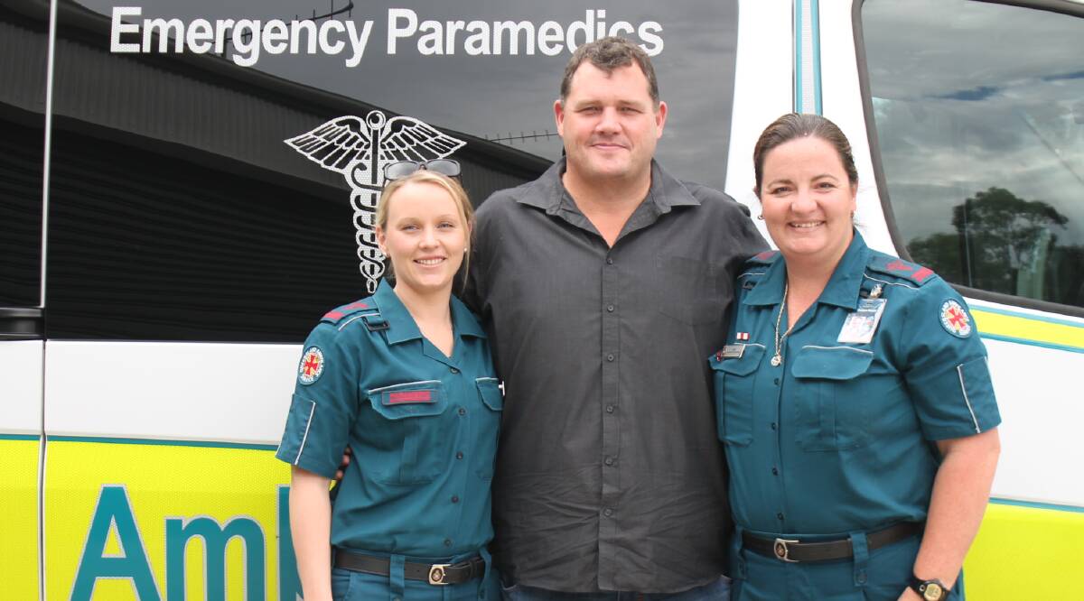 HEROES: Troy Peace meets with advanced care paramedics Bec Macdonald and Sue Neale for the first time since they helped save his life. Photo: Georgina Bayly