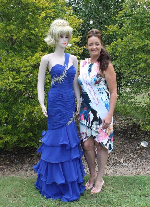 FUNDRAISING: Miss Diamond Australia contestant Louise Davis with one of her many pageant dresses.
