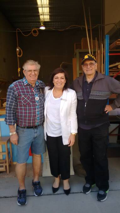 OPEN DAY: Leeanne Enoch with shed member Mike Ross and shed leader John Robinson. Photo: Supplied