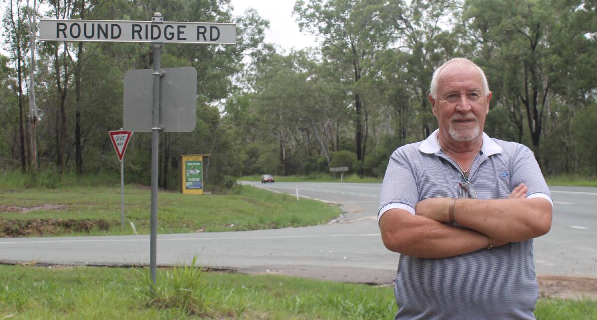 LIGHTING: Neighbourhood Watch member Terry Williams said safety at the Round Ridge Road intersection would be improved with the additon of lighting. Photo: Georgina Bayly