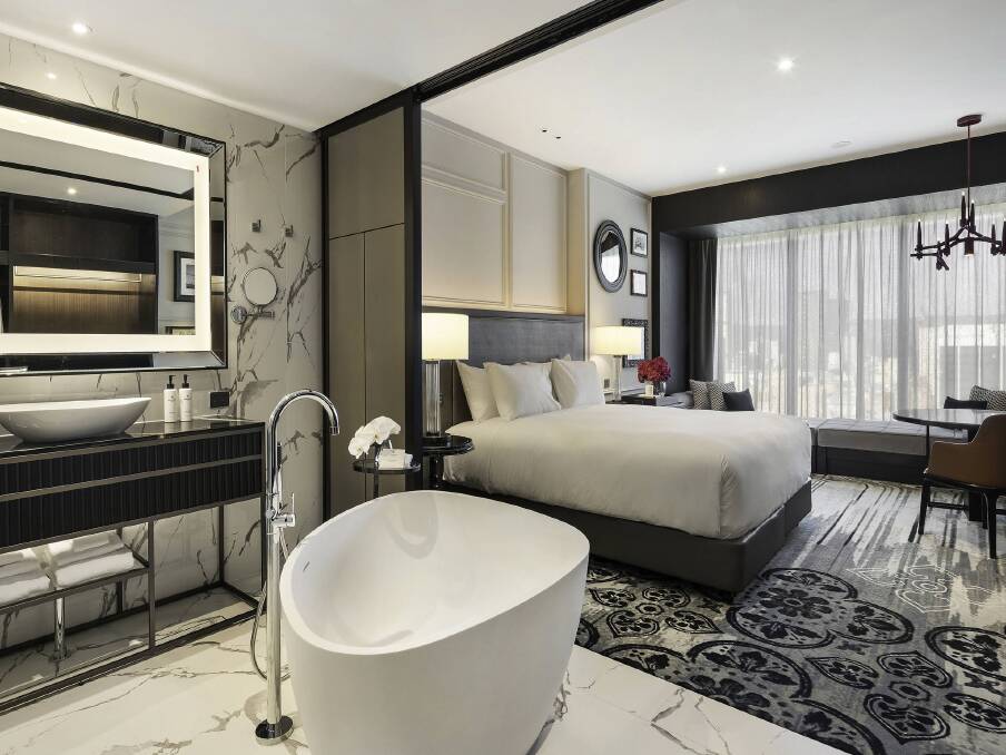 Luxury Room featuring a standalone bathtub.