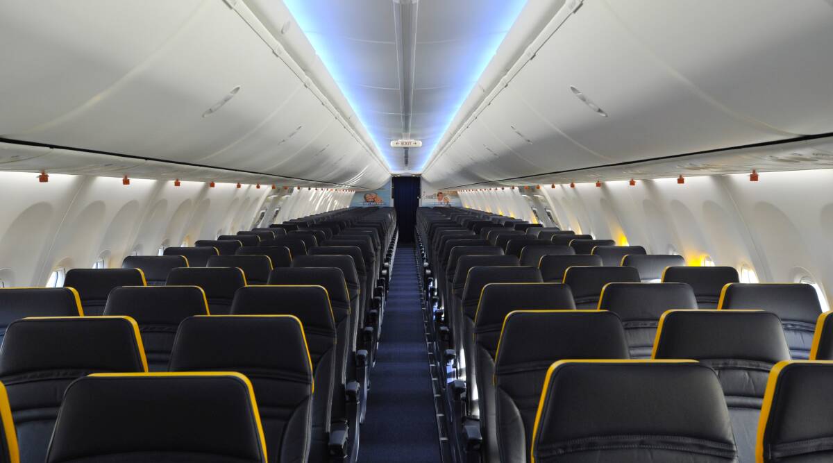 The plasticky hard blue and yellow seatbacks make it look more like a bus. The plasticky hard blue and yellow seatbacks make it look more like a bus.