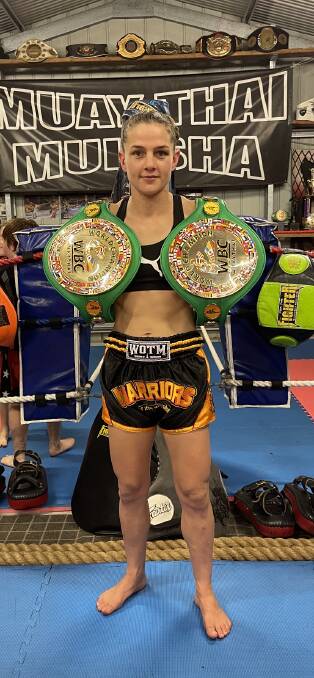REIGNING CHAMP: Munruben Muay Thai fighter Kim Townsend is the first person in WBC history to hold simultaneous world titles in different weight classes. Picture: Chris Johnstone.