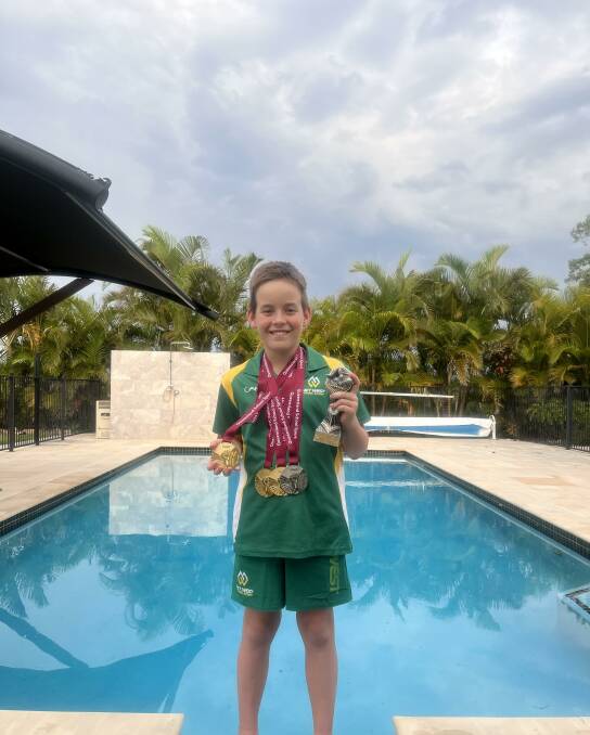 WINNERS ARE GRINNERS: Broc Simpson won three gold medals and was named age champion at the recent Queensland State Swimming Championships. Picture: Nikki Simpson.