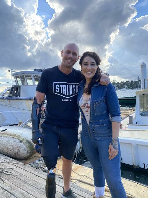 Paul de Gelder lost two limbs to a shark attack and now devotes his life to shark conservation, which inspired Ms Benzie (right). Picture supplied.