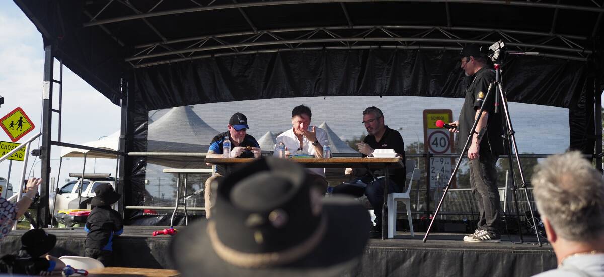 Competition judge, Mayor Darren Power (centre) said the ribs were among the best he'd ever had. Picture by Joe Colbrook