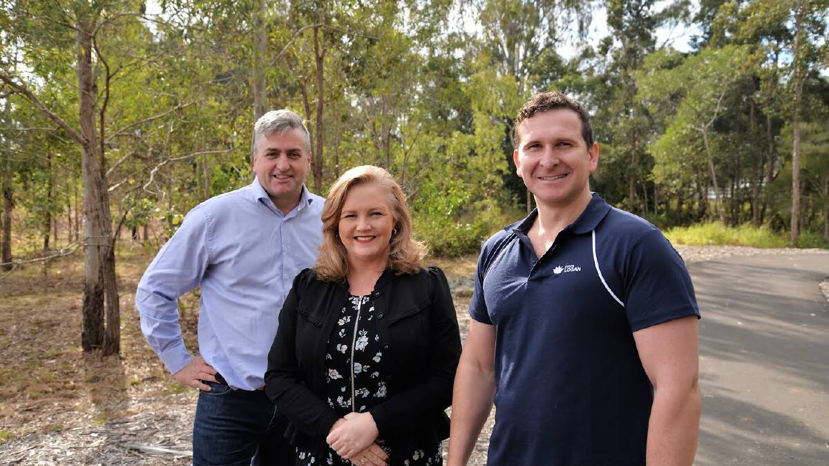 ON TRACK: Member for Logan Linus Power at the existing Logan Village to Yarrabilba Rail Trail with Councillors Laurie Koranski and Tony Hall. Picture: Logan City Council.