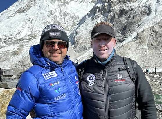 Rob Flanagan with Sydney Roosters coach Trent Robinson after reaching Everest Base Camp. Picture supplied