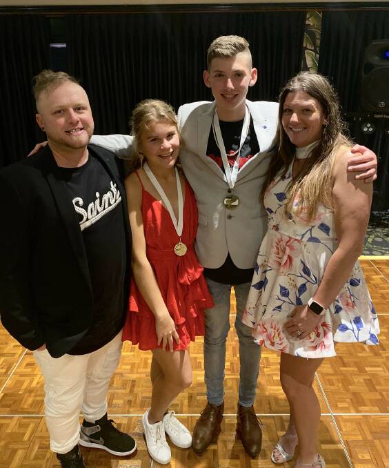 AWARDED: FuturePros Tennis Academy coaches Kiel Lindner (left) and Aj Thompson (right) with Jenna Potts and Hunter Thompson at the Tennis Gold Coast annual awards night on October 12. 