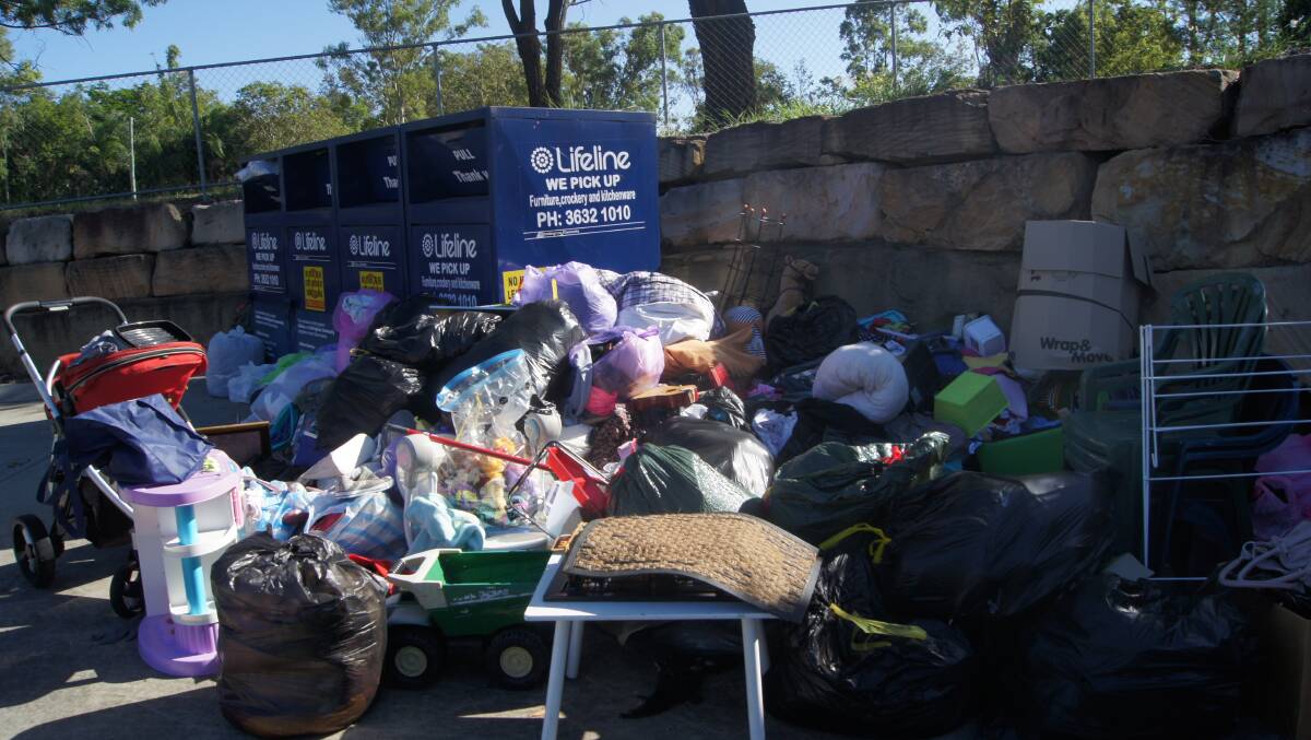 CONTAMINATED: Items were left dumped outside of Lifeline Charity bins in Jimboomba on January 10. Photo: Jacob Wilson