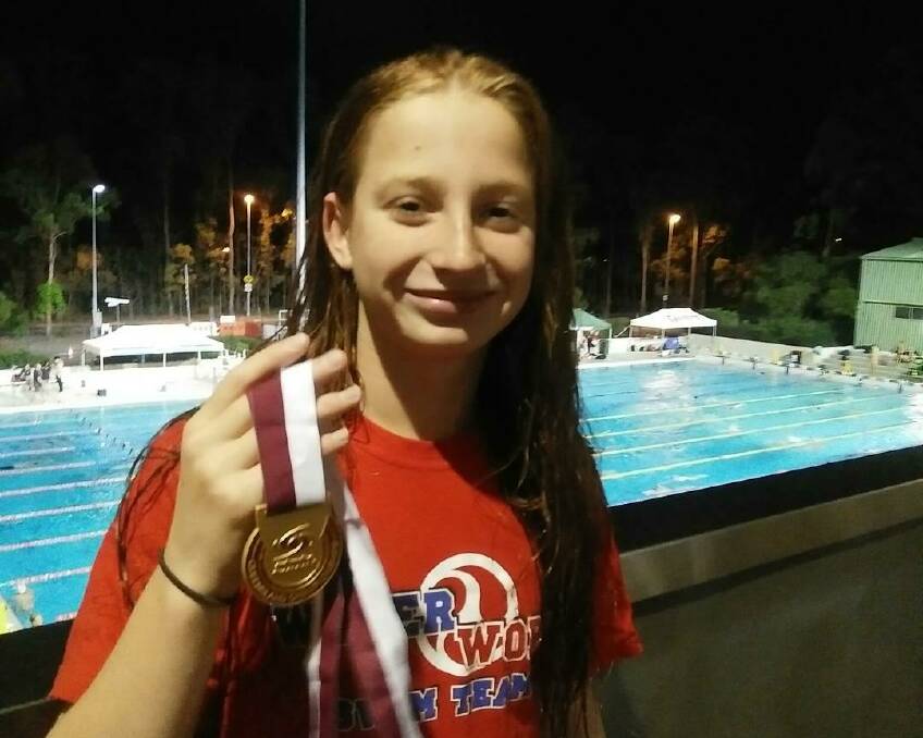 GOLD: Mollie O'Callaghan won three gold medals at the Queensland State Championships. Photo: Supplied