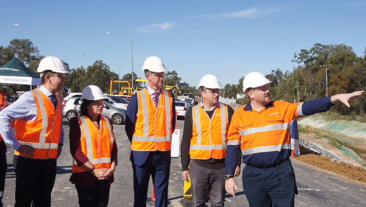 Infrastructure minister Cameron Dick, Algester MP Leanne Enoch, Transport and Main Roads minister Mark Bailey, Logan MP Linus Power and project director Andy Richardson. Photo: Jacob Wilson