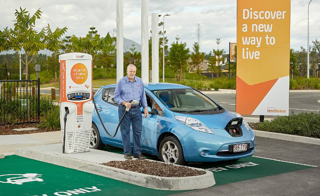 CHARGE: Yarrabilba resident Jim Barbey charging his electric car at Yarrabilba in 2017. Photo: Supplied