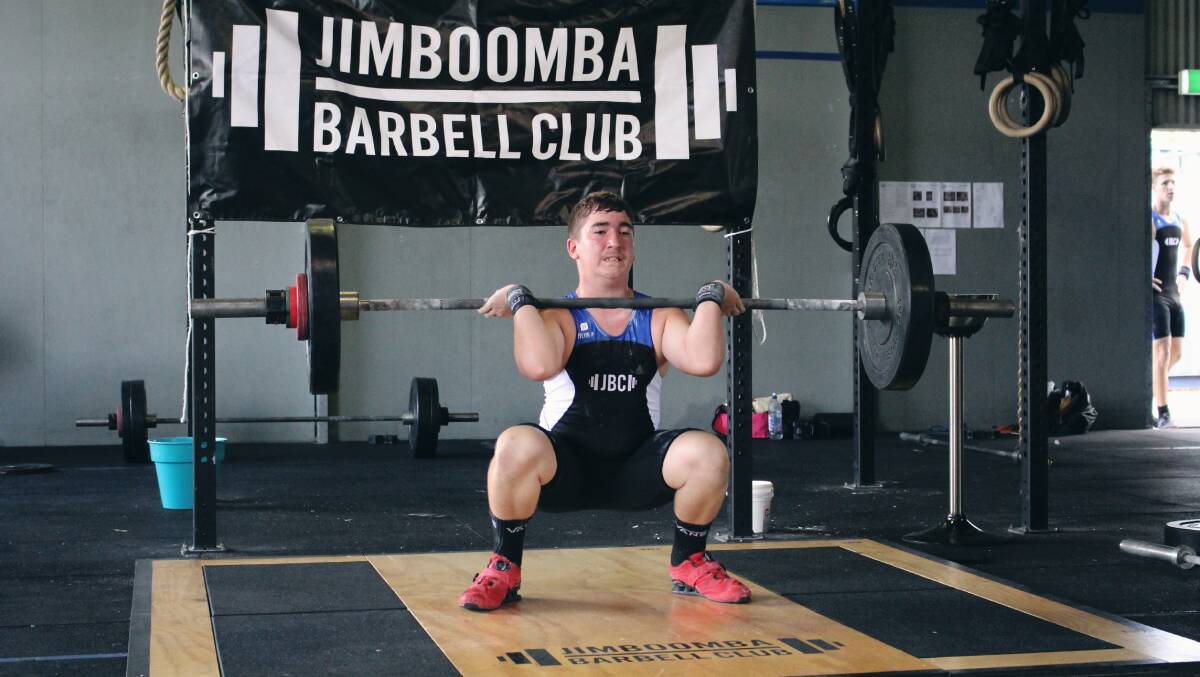 INTENSITY: Jimboomba Barbell Club member Josh Reynolds won a silver medal at the Queensland under 15 and youth championships.