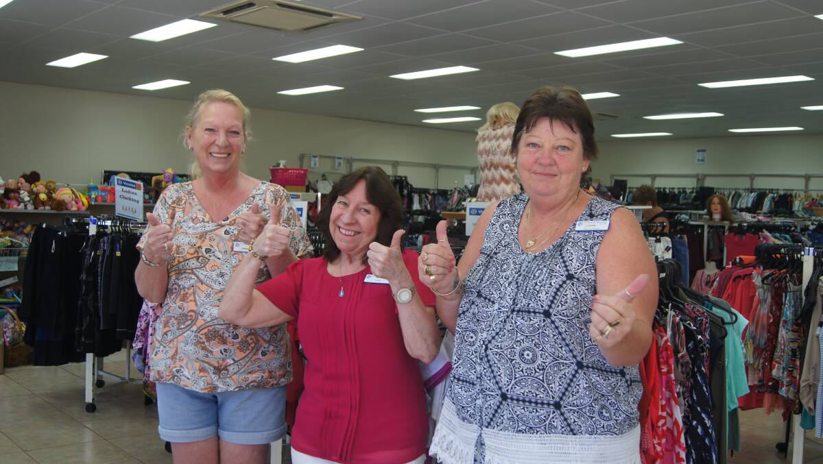 HAPPY DAYS: Browns Plains Vinnies volunteers Jeanne Clarkson and Fran Smith with store manager Lynette Parkin. Photo: Jacob Wilson
