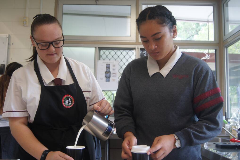 OVERSEAS EXPERIENCE: Year 11 students Joni Takai  Rachel Stephens will get a chance to experience five star hospitality in Europe this year. Photo: Jacob Wilson