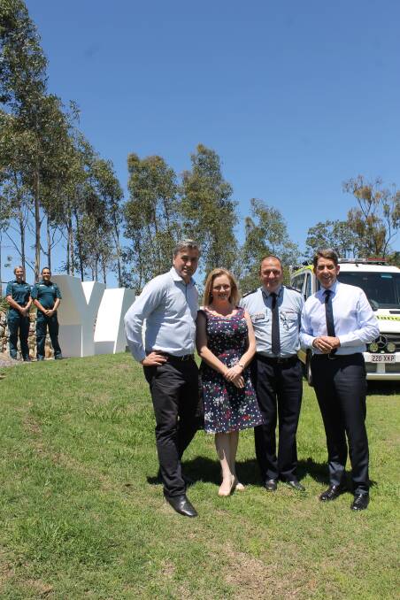 ANNOUNCEMENT: Logan MP Linus Power, councillor Laurie Koranski, QAS Commissioner Russell Bowles and Minister Cameron Dick, with (back) paramedics Lisa Carter and Chris Perera. Photo: Cheryl Goodenough