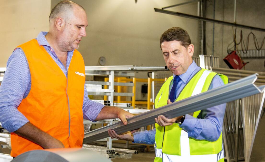 FUNDING: Oxworks co-director Glenn Hosking with Manufacturing Minister Cameron Dick.
