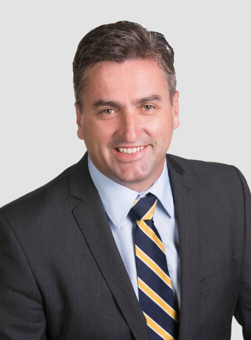 PARLIAMENT: Logan MP Linus Power defended his record on the Mount Lindesay Highway this month.