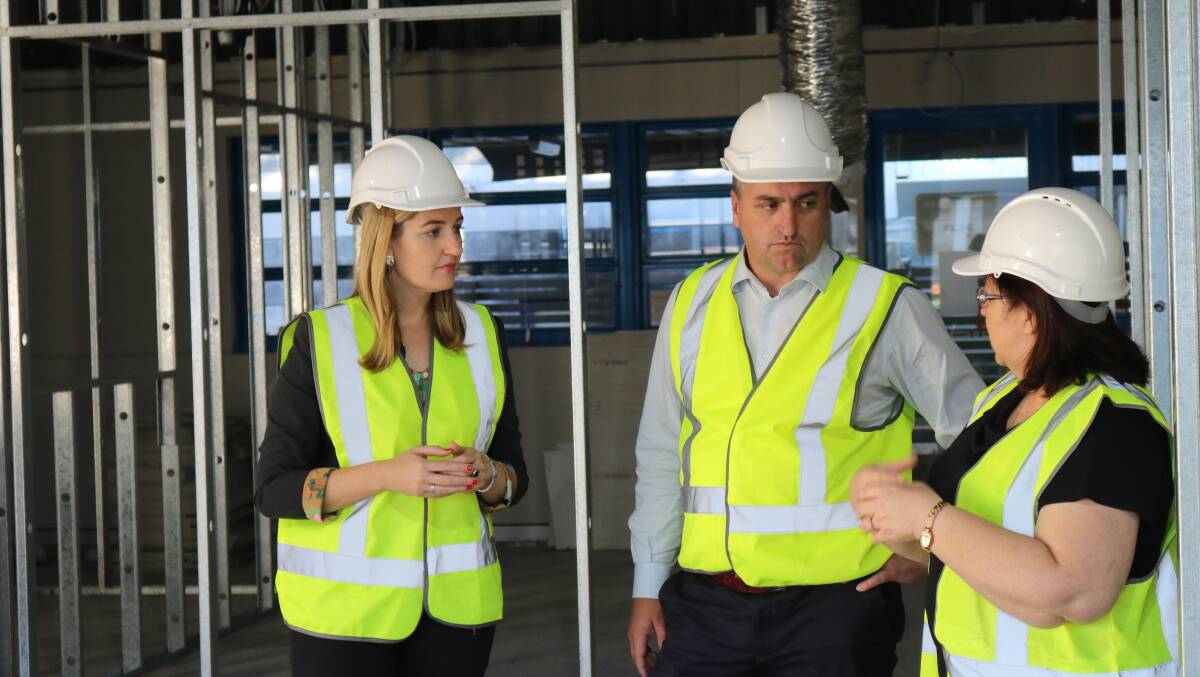 PROGRESS: Waterford MP Shannon Fentiman with Logan MP Linus Power overseeing the $3.16 million Loganlea TAFE construction project.