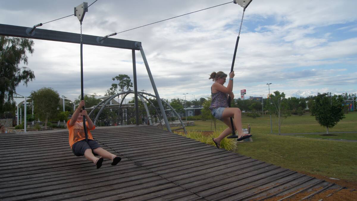 Owen and oriana Elder from Algester got into the swing of things at Darlington Park in Yarrabilba on Thursday afternoon.